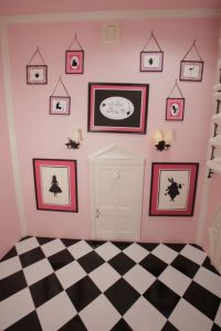 Alice paintings and checkered floor